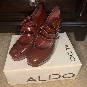 Burgundy platform Aldo heels size 10.